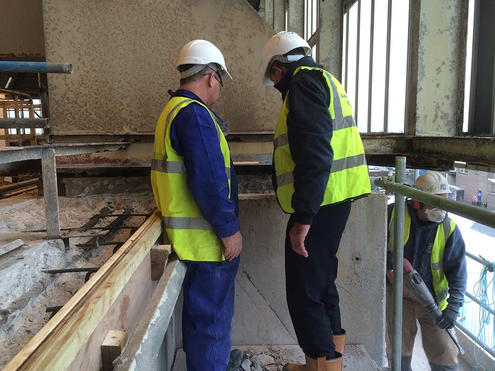 high level concrete repairs a&a ashton scaffolding team members hard hat safety