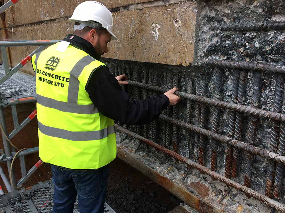 concrete repairs redundant pipe infill case studies worker team a&a ashton