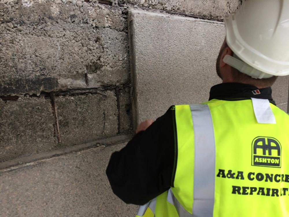slabs concrete a&a ashton removal shop front facade hard hat safety site case studies
